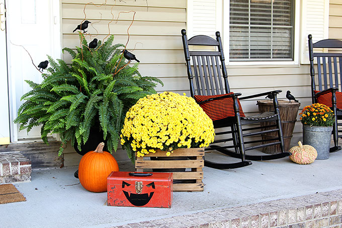 Outdoor Halloween decorations on front porch